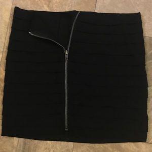 Black ruffled mini skirt
